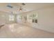 Bright living room with tile floors, large windows, skylight and neutral paint, perfect for relaxation at 15610 N 98Th Ave # 26, Sun City, AZ 85351
