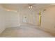 Open-concept living area featuring neutral tones, seamlessly connecting to the dining space at 15610 N 98Th Ave # 26, Sun City, AZ 85351