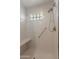 Shower stall with bench and glass block window at 15610 N 98Th Ave # 26, Sun City, AZ 85351