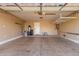 Spacious garage with water heater and storage racks at 16605 W Pierce St, Goodyear, AZ 85338
