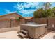 View of private backyard hot tub featuring three steps for easy access at 1770 W Browning Way, Chandler, AZ 85286