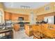 Well-appointed kitchen with granite countertops, stainless appliances, and ample cabinet space at 1770 W Browning Way, Chandler, AZ 85286