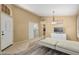 Inviting living room with tile entry, wood-look floors, and neutral color scheme at 1770 W Browning Way, Chandler, AZ 85286