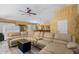 Inviting living room with an oversized sectional couch and neutral color palette at 1770 W Browning Way, Chandler, AZ 85286