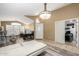 Inviting living room with tile entry, wood-look floors, and neutral color scheme at 1770 W Browning Way, Chandler, AZ 85286