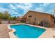 Backyard shot of a sparkling blue private pool, hot tub and desert landscaping at 1770 W Browning Way, Chandler, AZ 85286