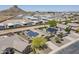 Community aerial view featuring homes with solar panels, pools, and landscaping at 1813 N Lewis Pl, Casa Grande, AZ 85122
