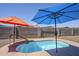 Backyard includes a built-in spa with sunshades, creating a private outdoor oasis at 1813 N Lewis Pl, Casa Grande, AZ 85122