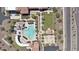 Overhead shot of community pool with lounge seating, grassy area and a covered pavilion at 18371 W Sunrise Dr, Goodyear, AZ 85338