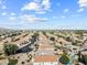 Wide aerial perspective of an orderly residential area with consistent housing and manicured landscapes at 22274 E Cherrywood Ct, Queen Creek, AZ 85142
