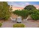 Well-maintained backyard featuring a paved patio area with stylish outdoor seating at 22274 E Cherrywood Ct, Queen Creek, AZ 85142