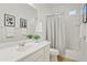 Bright bathroom with white vanity, shower-tub combination, and neutral paint at 22274 E Cherrywood Ct, Queen Creek, AZ 85142