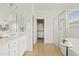 Spacious primary bathroom with double vanity, walk-in shower, and separate closet entrance at 22274 E Cherrywood Ct, Queen Creek, AZ 85142