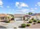 Charming single-story home with a well-manicured lawn and inviting curb appeal in a friendly neighborhood at 22274 E Cherrywood Ct, Queen Creek, AZ 85142