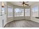 Breakfast nook filled with natural light, wood-look flooring and a ceiling fan at 2247 W Highland St, Chandler, AZ 85224