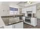 Kitchen with stainless steel appliances, granite countertops and a bay window at 2247 W Highland St, Chandler, AZ 85224