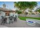 Backyard features a firepit, built-in seating, and BBQ perfect for outdoor entertaining and relaxing at 2406 E Oakland St, Chandler, AZ 85225