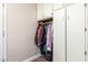 Utility Closet featuring built-in shelving and ample storage, including overhead cabinets and closet rod at 2406 E Oakland St, Chandler, AZ 85225