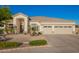 Beautiful one-story home featuring a well-manicured desert yard and a convenient three-car garage at 2406 E Oakland St, Chandler, AZ 85225