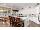 Expansive kitchen featuring a large island, white cabinetry, granite countertops, and a cozy breakfast nook at 2406 E Oakland St, Chandler, AZ 85225