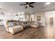 Open-concept living area featuring hard surface floors and a seamless transition to the kitchen at 2406 E Oakland St, Chandler, AZ 85225