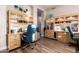 Bright office space with custom cabinets, wood floors, and comfortable seating offers a perfect work environment at 2406 E Oakland St, Chandler, AZ 85225