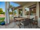 Charming covered patio featuring a dining area, providing a relaxing outdoor living space at 2406 E Oakland St, Chandler, AZ 85225