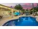 Beautiful pool with string lights and an outdoor patio create an inviting backyard oasis at 2406 E Oakland St, Chandler, AZ 85225