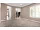 Spacious living room with neutral paint, plush carpet, and an open layout at 2454 W Hope Cir, Chandler, AZ 85248