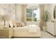Bright bedroom featuring a window with neutral drapes, a white dresser, and a neutral patterned floor at 25162 N 177Th Dr, Surprise, AZ 85387