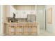 Kitchen island with seating, modern appliances, and pendant lighting at 25162 N 177Th Dr, Surprise, AZ 85387