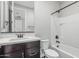 Bathroom with a modern vanity, framed mirror, and a shower-tub combination at 2557 N Springfield St, Buckeye, AZ 85396