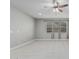 Neutral bedroom with carpet, a ceiling fan, and large windows offering plenty of natural light at 2557 N Springfield St, Buckeye, AZ 85396