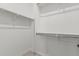 This closet is equipped with shelving and hanging rods to maximize storage capacity at 2557 N Springfield St, Buckeye, AZ 85396