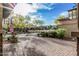 Exterior view showcasing a paver driveway and views of the community at 2557 N Springfield St, Buckeye, AZ 85396