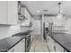 Bright kitchen with stainless steel appliances, modern countertops, and white cabinets at 2557 N Springfield St, Buckeye, AZ 85396