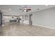 Spacious living area merges seamlessly with a modern kitchen, ideal for entertaining at 2557 N Springfield St, Buckeye, AZ 85396
