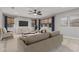 Inviting living room featuring a comfortable sofa, modern decor, and natural light at 2557 N Springfield St, Buckeye, AZ 85396