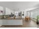 Bright kitchen featuring tile countertops, an island, stainless steel appliances, and a breakfast nook at 285 W Goldfinch Way, Chandler, AZ 85286