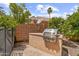 Built-in outdoor grill in the backyard at 285 W Goldfinch Way, Chandler, AZ 85286
