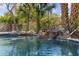Backyard pool featuring waterfall and rocks at 285 W Goldfinch Way, Chandler, AZ 85286