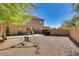 Spacious backyard featuring a playground with swings and plenty of room for outdoor activities at 29023 N 46Th Way, Cave Creek, AZ 85331