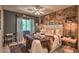 Charming bedroom with wood accent wall, plush bedding, and stylish decor creating a cozy retreat at 29023 N 46Th Way, Cave Creek, AZ 85331