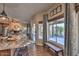 Bright kitchen with granite counters, stainless appliances, and a breakfast bar overlooking the outdoor patio at 29023 N 46Th Way, Cave Creek, AZ 85331
