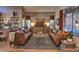 Comfortable living room with leather sofas, large windows, and stylish decor at 29023 N 46Th Way, Cave Creek, AZ 85331