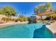 Beautiful pool area with a covered patio, providing a relaxing space to cool off during warm weather at 29023 N 46Th Way, Cave Creek, AZ 85331