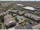 An aerial shot of the community showcases the buildings, pool, landscaping, and surrounding neighborhood at 29606 N Tatum Blvd # 174, Cave Creek, AZ 85331