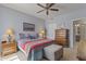 Bright bedroom with carpet, ceiling fan and stylish furnishings at 29606 N Tatum Blvd # 174, Cave Creek, AZ 85331