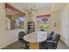 Conference room with a large table, seating, and lots of light from the windows at 29606 N Tatum Blvd # 174, Cave Creek, AZ 85331