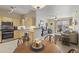 Open-concept kitchen, dining, and living area with plenty of natural light at 29606 N Tatum Blvd # 174, Cave Creek, AZ 85331